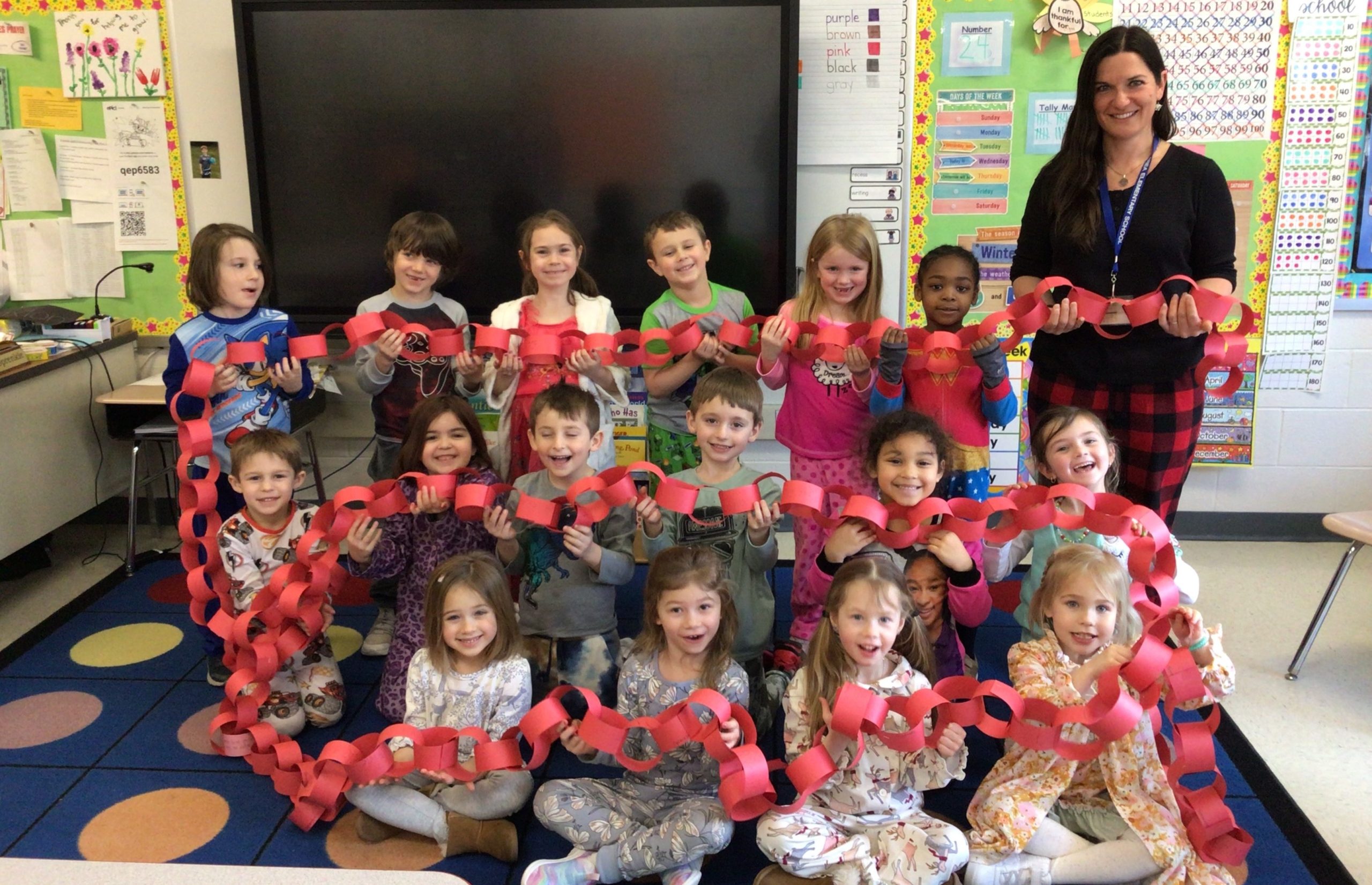 Students at the elementary school were challanged to demonstrate random acts of kindness and earn as many chain links as they could throughout the month of February.  Mrs. Sprenke’s class collected the most chain links – 156
