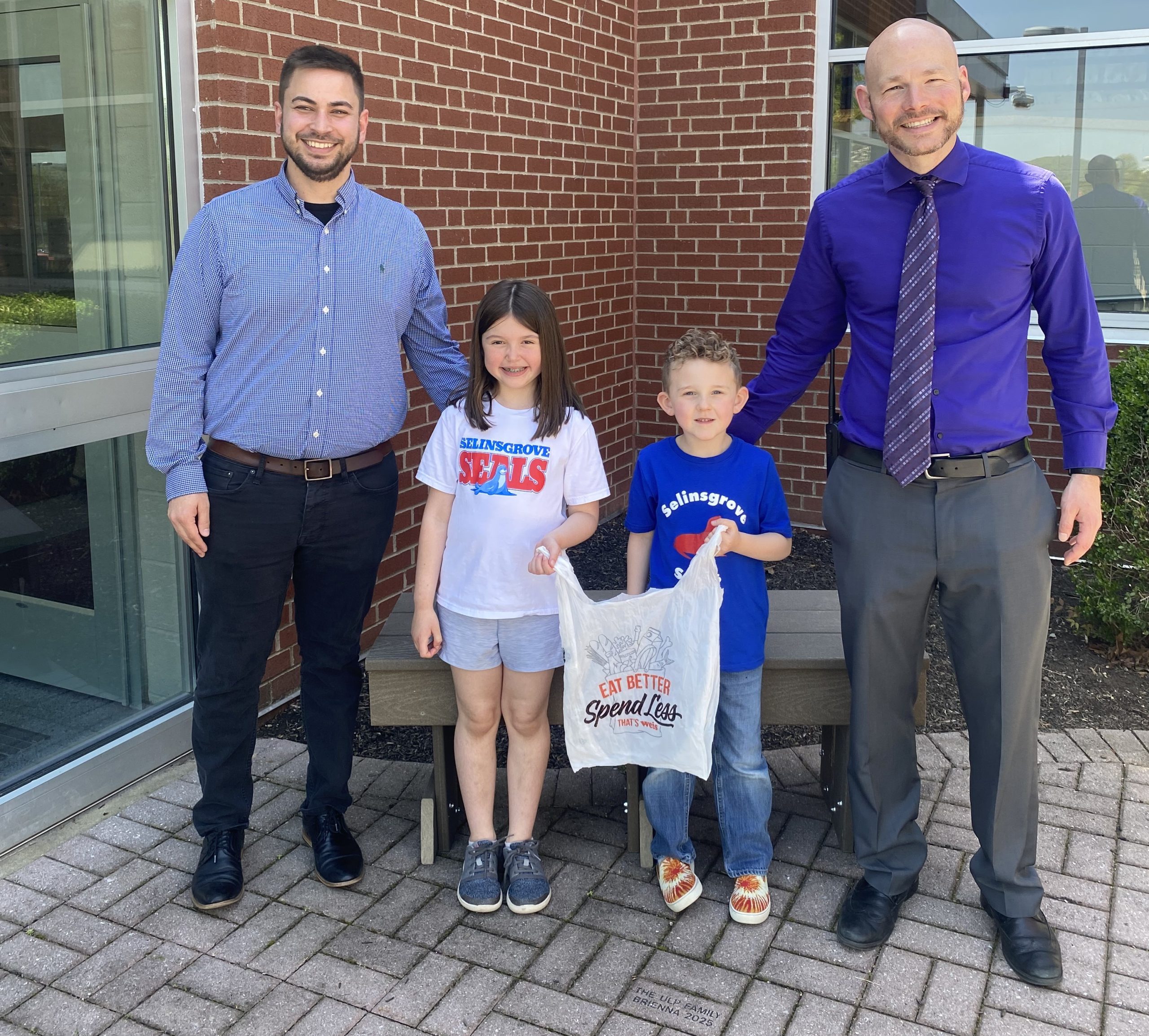 The Elementary School teamed up with Weis Markets and Trex to participate in Trex’s nationwide recycling program to turn 10,000 grocery bags into a bench.  The goal was met within a month.  Weis Markets kindly donated 2 additional benches to our school.  Students pictured are Benjamin Sutfin and Ellie Rehrer.