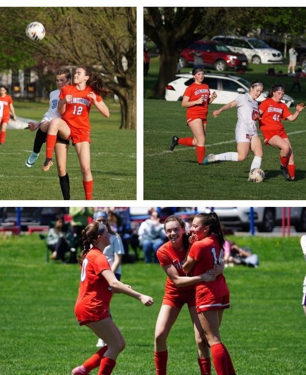 JH Soccer Hannah Boyer & Lissa Kruskie battle for the ball & Kinnley Weiser celebrates her goal!