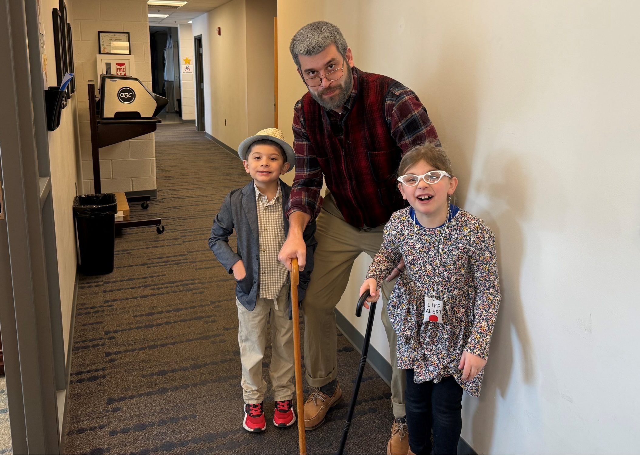 Dr. Moyer, Ava and Finley dressed up for the 100th day of school.